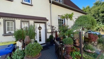 Charmantes Reihenmittelhaus in Gladbeck-Zweckel, modernisiert, gemütlich, mit Garten und Garagen