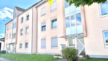 Attraktive 3,5-Zimmer-Wohnung mit Garten und Tiefgaragenstellplatz