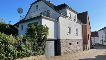 Freistehendes Einfamilienhaus mit idyllischem Garten und zentraler Lage